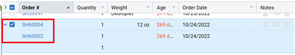 An order expanded, showing the two order numbers that were combined.