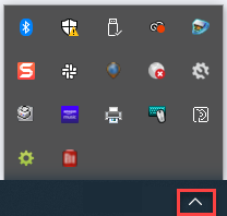La flecha para mostrar iconos ocultos aparece resaltada en la barra de herramientas del escritorio.