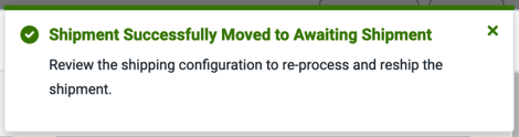Popup reads, Shipment successfully moved to Awaiting Shipment. Review the Shipping configuration to re-process and reship the shipment.