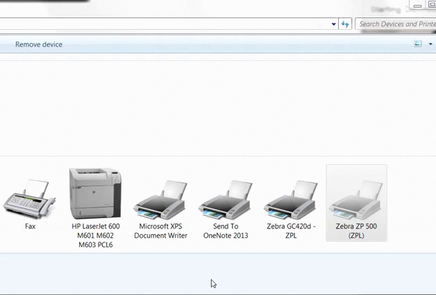 Demonstrating opening the Windows Printing Preferences menu for Zebra printer and setting printing options.