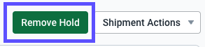 Click the remove hold button at the top of order details.