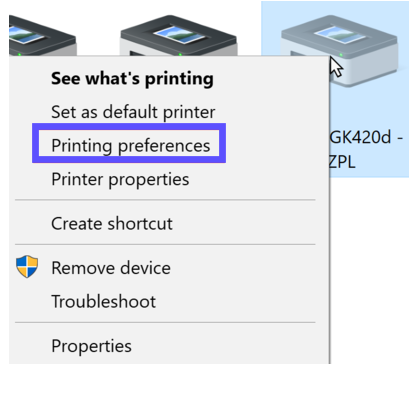 Right-click menu of Zebra printer open with Printing Preferences option highlighted.